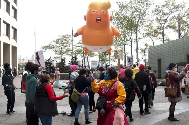 A photo of the baby Trump balloon at a protest